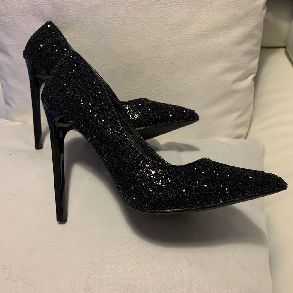 Black heels shoes. New